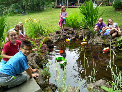 In Toy Inventor's Workshop, campers designed, built, and tested water-powered boats, as well as wooden catapults, climbing toys, flying cars, unique paper airplanes, and other cool inventions. 